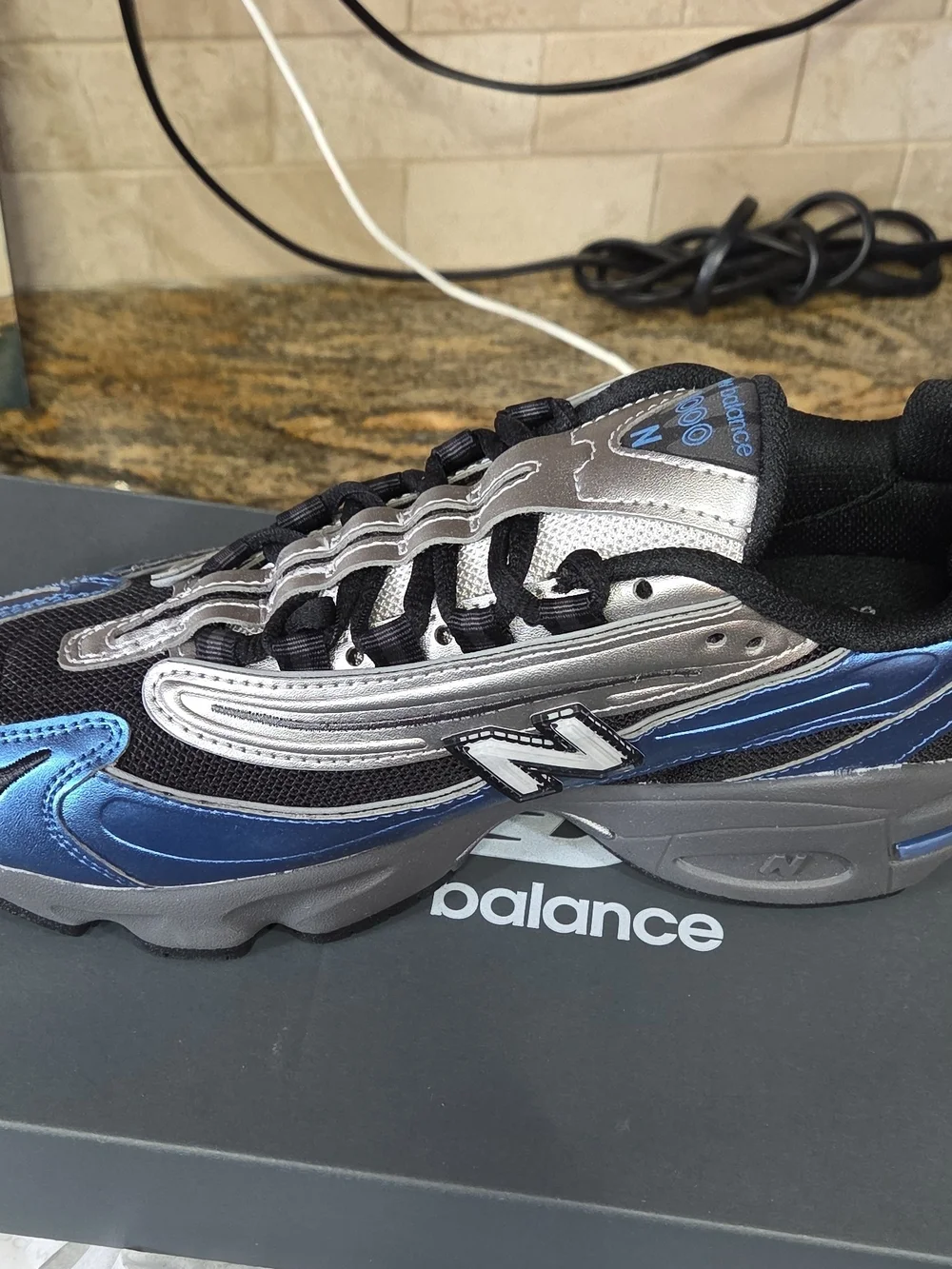 New Balance Metallic Blue and Silver Running Sneaker